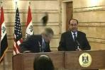 بوش يعلق مازحًا على حادث قذفه بحذاء في بغداد